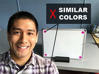 The color of my shirt is too similar to the magenta stickers I'm using. I should use the green stickers instead here.